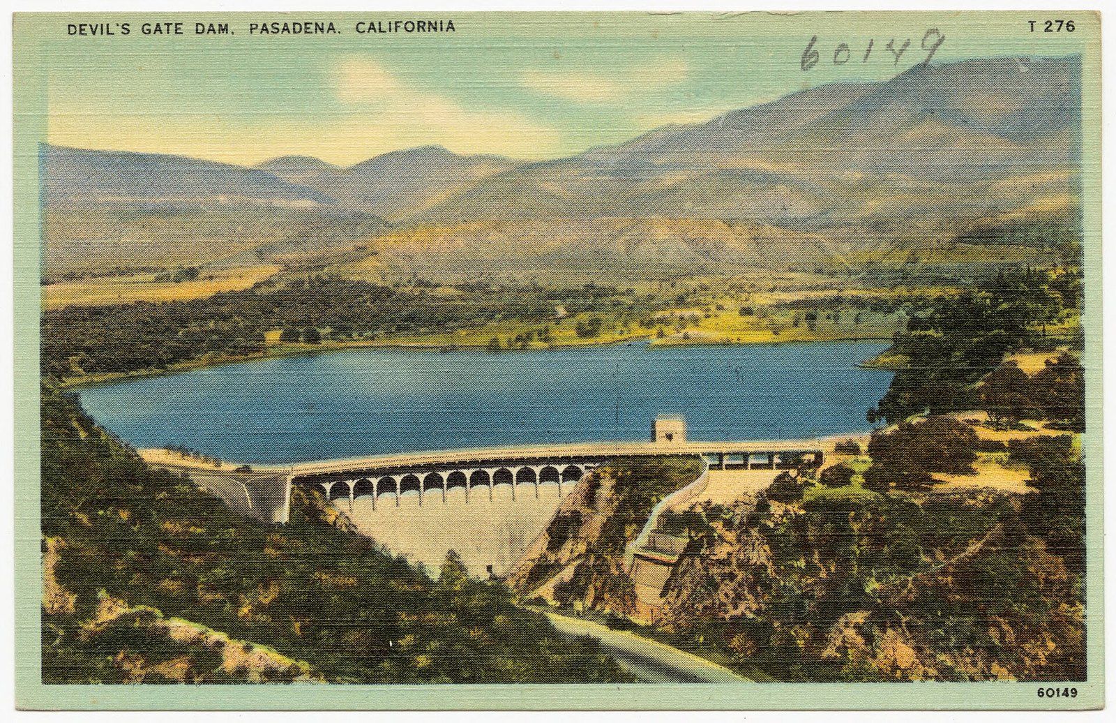 A vintage color postcard of Devil's Gate Dam and its reservoir below the San Gabriel Mount, a Wikimedia Commons photograph in the encyclopedia of Mike Kobeissi