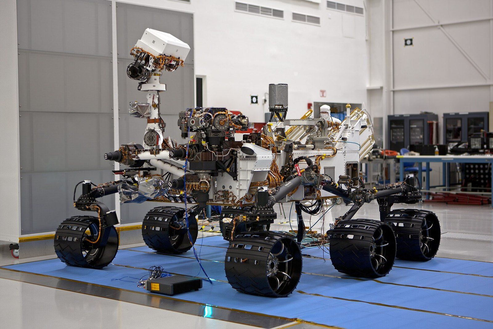 The Curiosity Mars rover on its wheels in the Spacecraft Assembly Facility at JPL in 2011, a Wikimedia Commons photograph in the encyclopedia of Mike Kobeissi