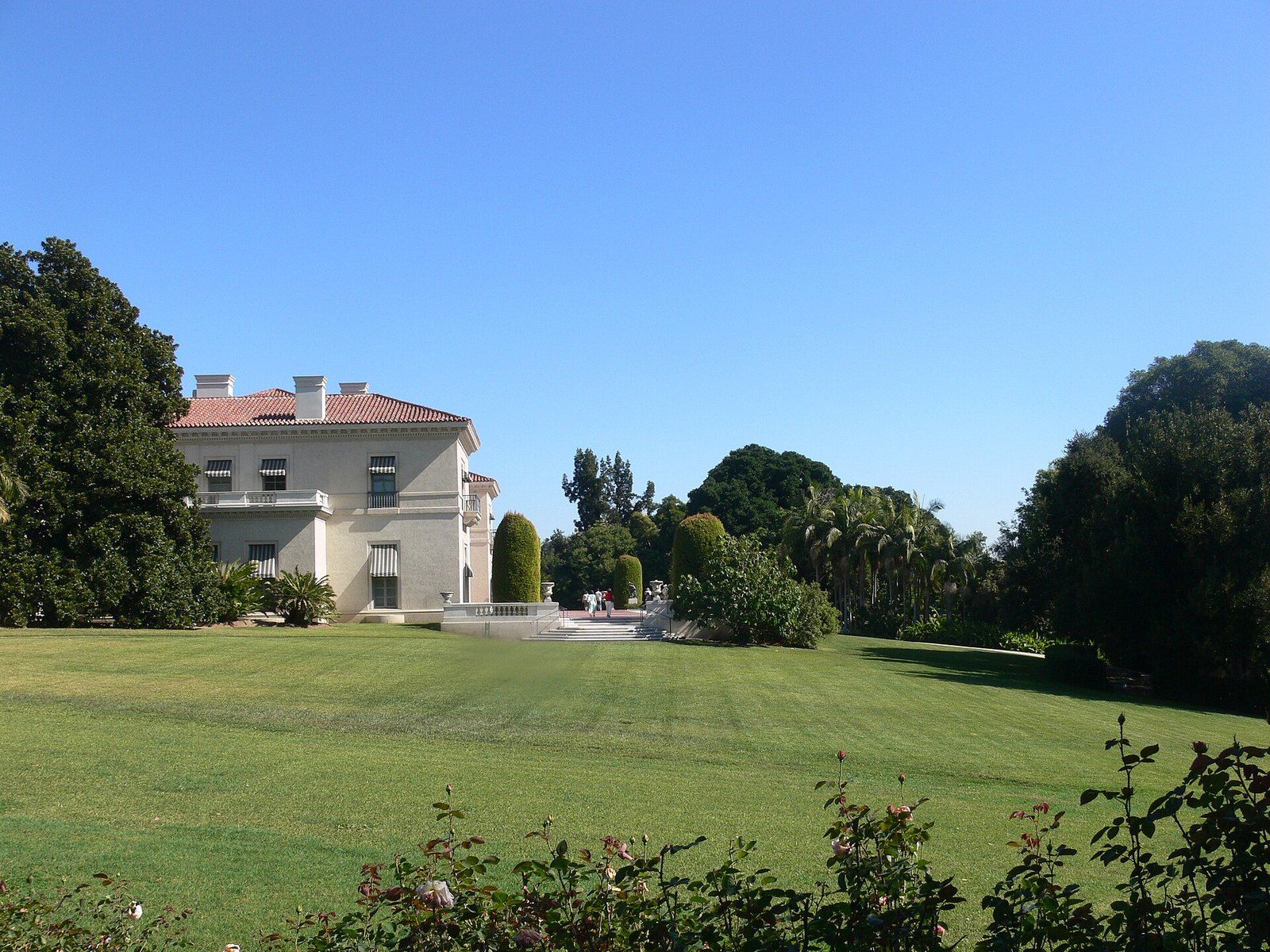 The Huntington mansion in San Marino seen across its lawn, a Wikimedia Commons photograph in the encyclopedia of Mike Kobeissi