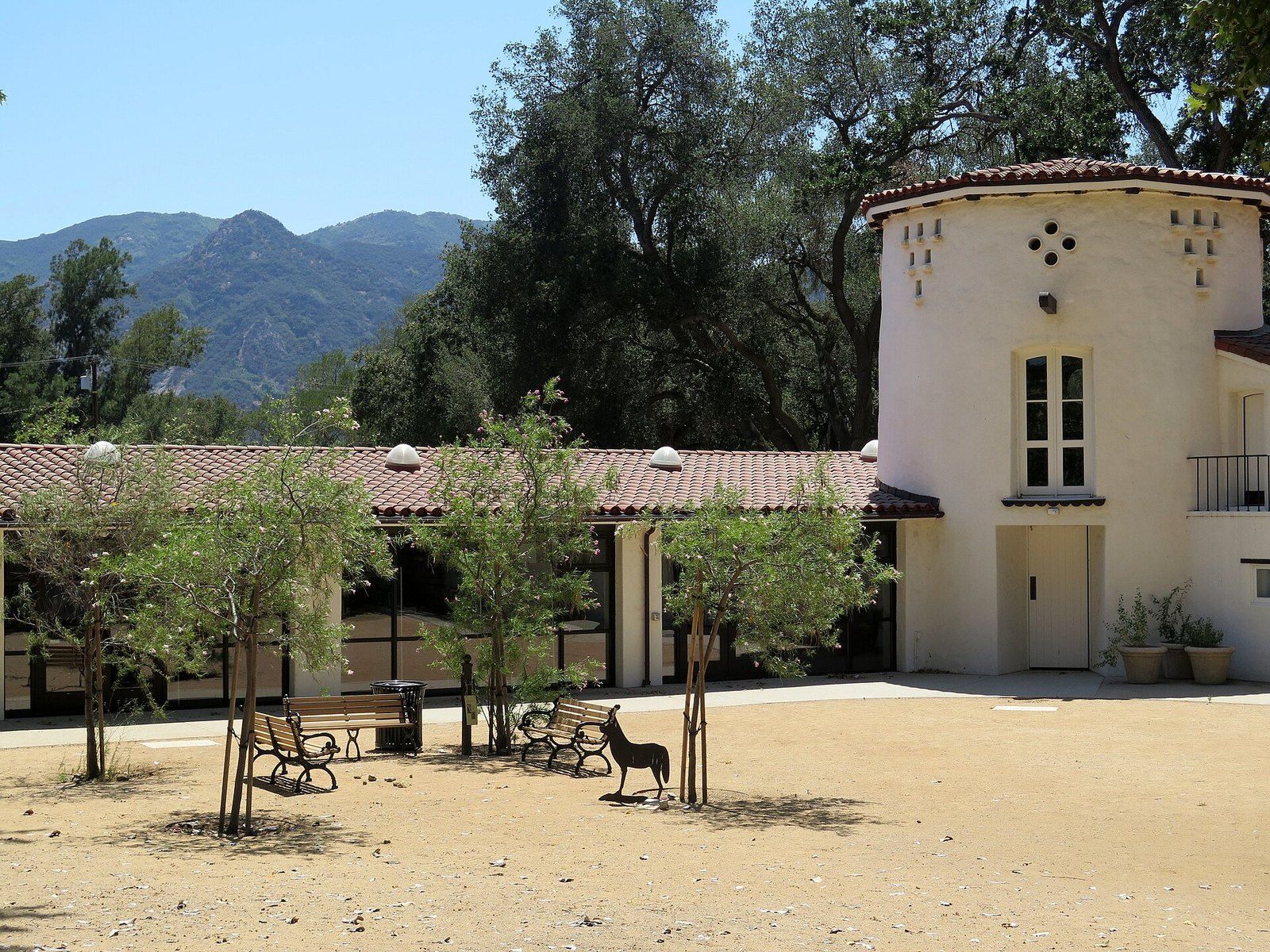 The white tower and courtyard of the King Gillette Ranch house in Calabasas below the Sant, a Wikimedia Commons photograph in the encyclopedia of Mike Kobeissi